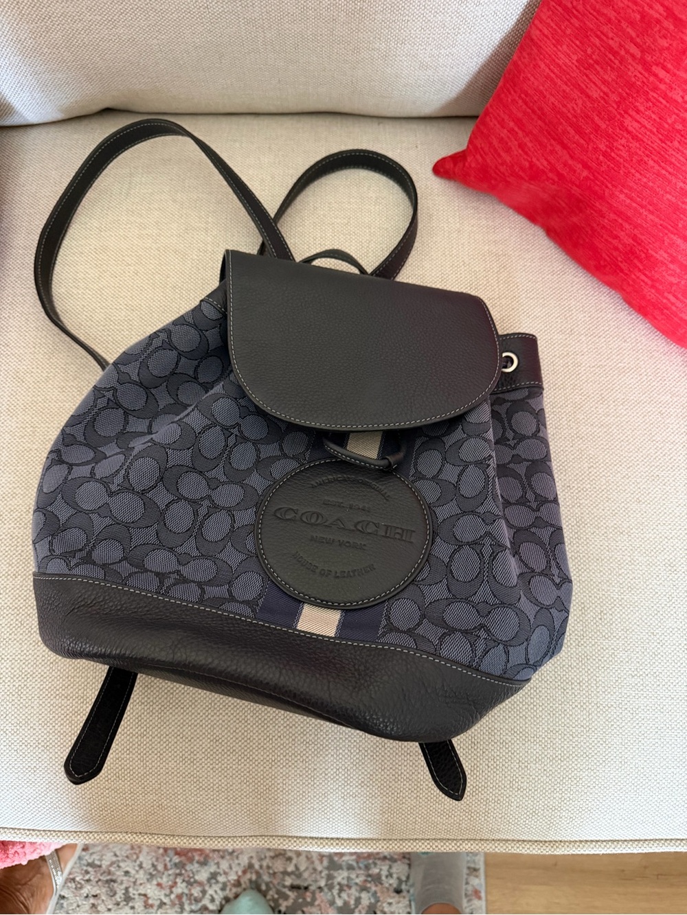Barely used navy blue coach backpack!